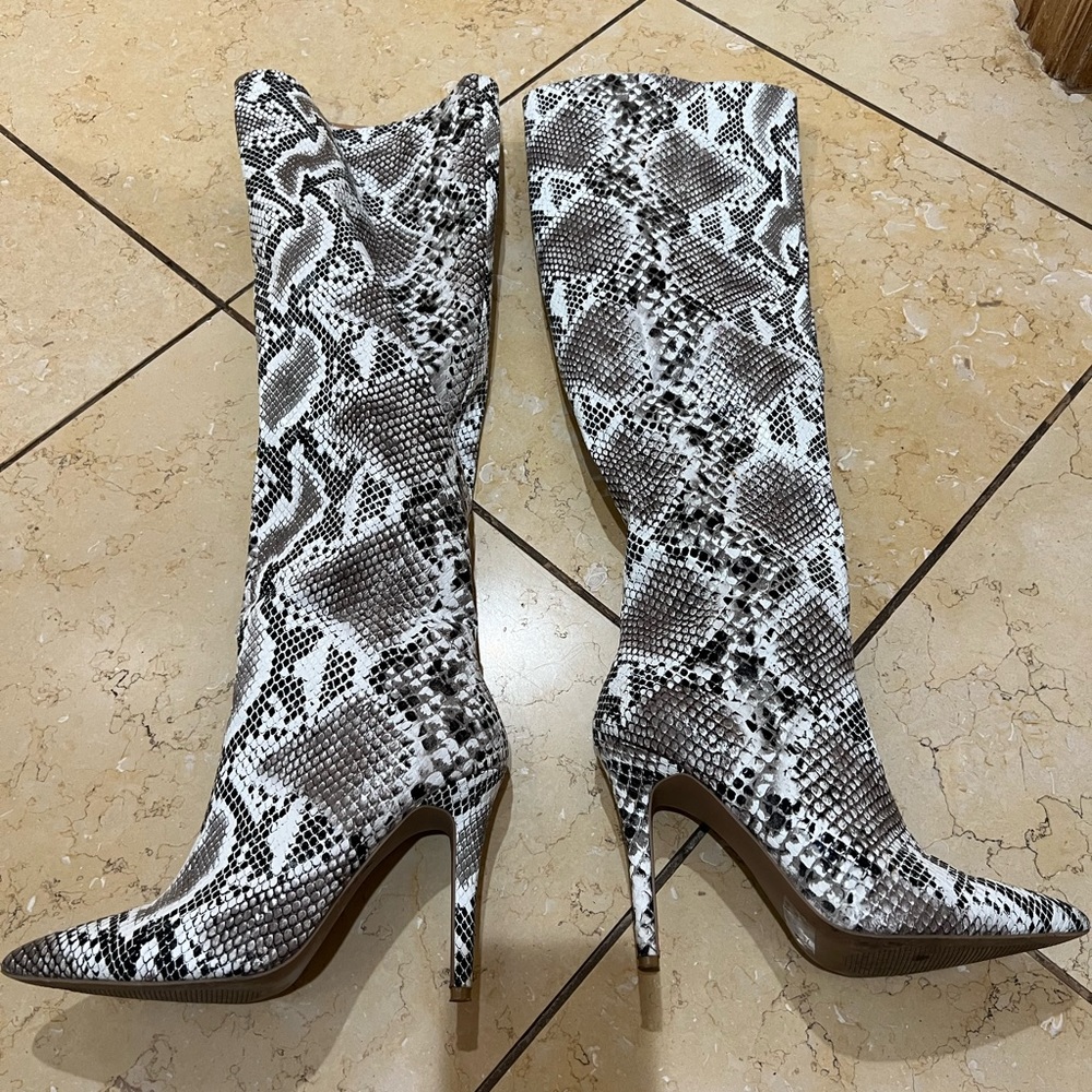Snake skin knee high boots